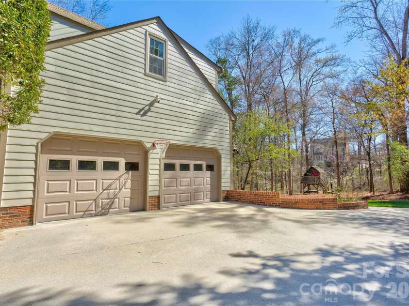 584 Sandringham Place, Concord, NC 28025.  MLS# CAR4359085, YatesRealty ID 14401. Side load oversize garage - heated/cooled