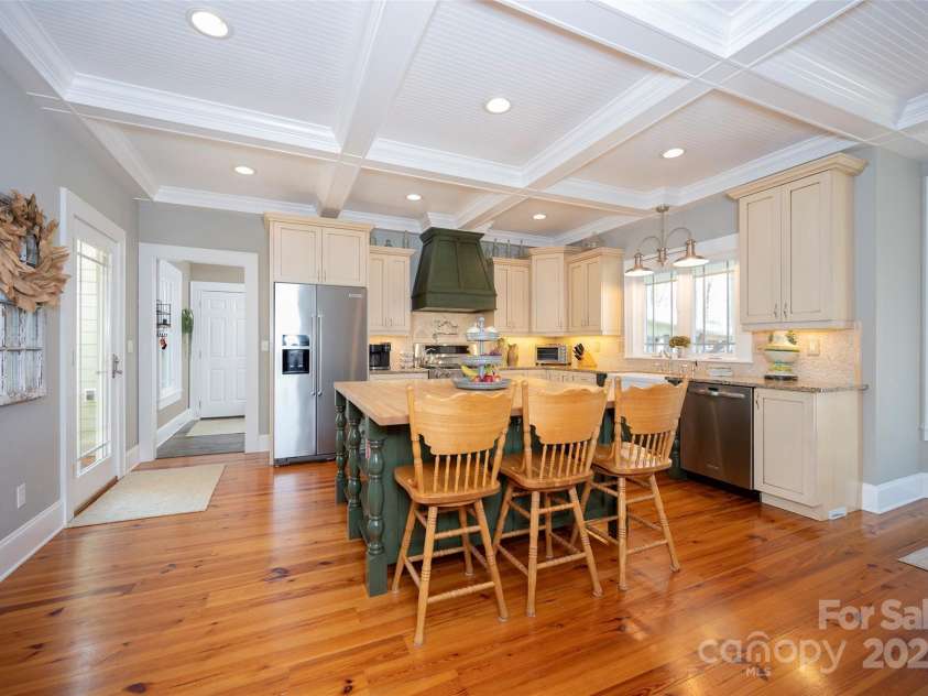153 Finn Hollow Lane, Advance, NC 27006.  MLS# CAR4241337, YatesRealty ID 14402. Exceptional Kitchen featuring this coffered ceiling with beadboard accents.