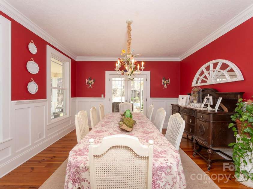 153 Finn Hollow Lane, Advance, NC 27006.  MLS# CAR4241337, YatesRealty ID 14402. Formal Dining Room with Wainscoting; French Doors to wrap around porch