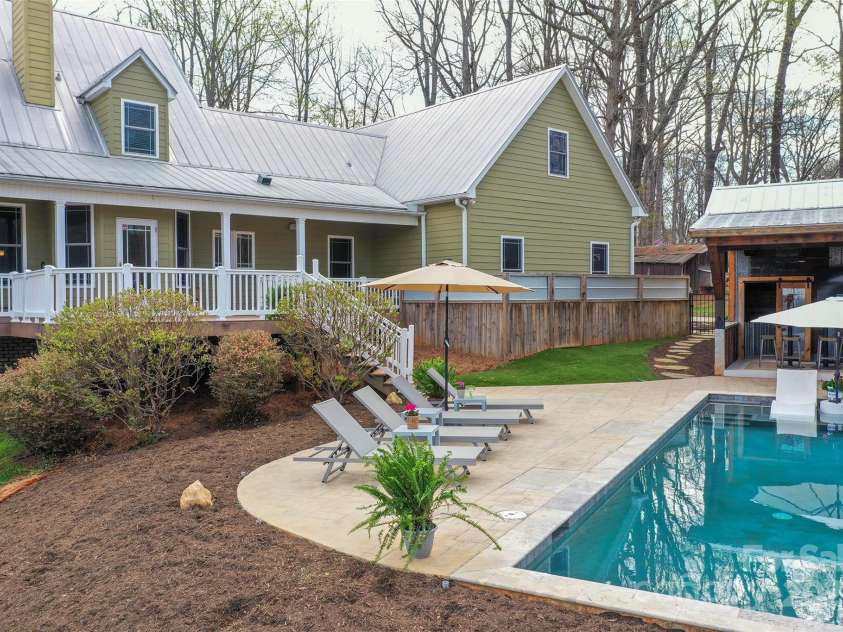 153 Finn Hollow Lane, Advance, NC 27006.  MLS# CAR4241337, YatesRealty ID 14402. Gunite Saltwater Sports Pool with Baja Shelf