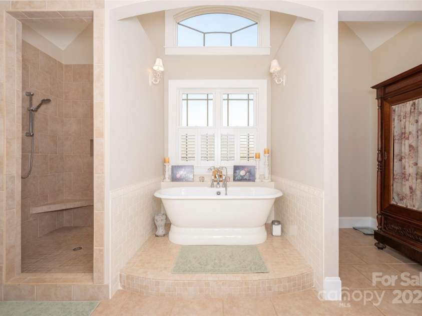 153 Finn Hollow Lane, Advance, NC 27006.  MLS# CAR4241337, YatesRealty ID 14402. Heated Tile Floors, Tiled Shower, Soaking Tub