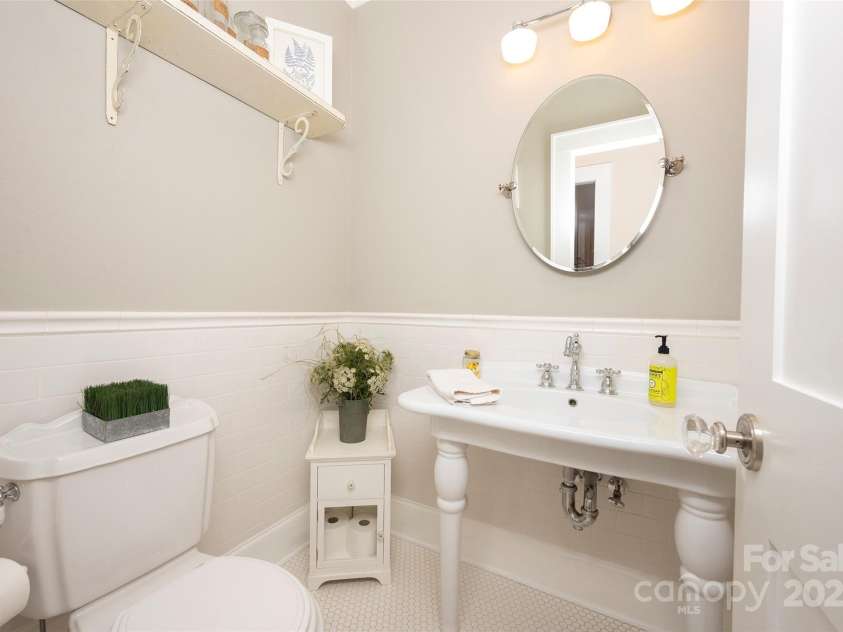 153 Finn Hollow Lane, Advance, NC 27006.  MLS# CAR4241337, YatesRealty ID 14402. Main Level Powder Room