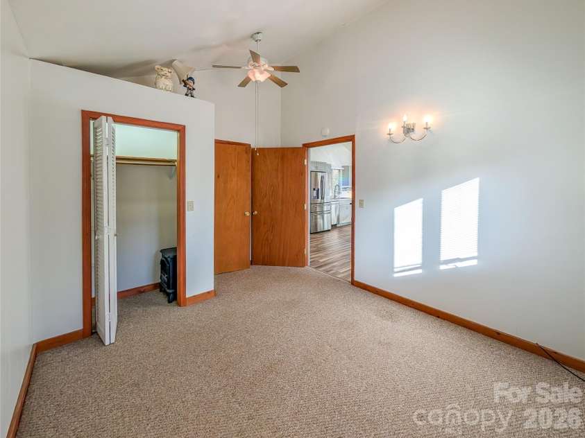 65 Happy Hollow Road, Green Mountain, NC 28740.  MLS# CAR4363965, YatesRealty ID 14402. Primary Bedroom with Access to Full Bathroom on Upper Level
