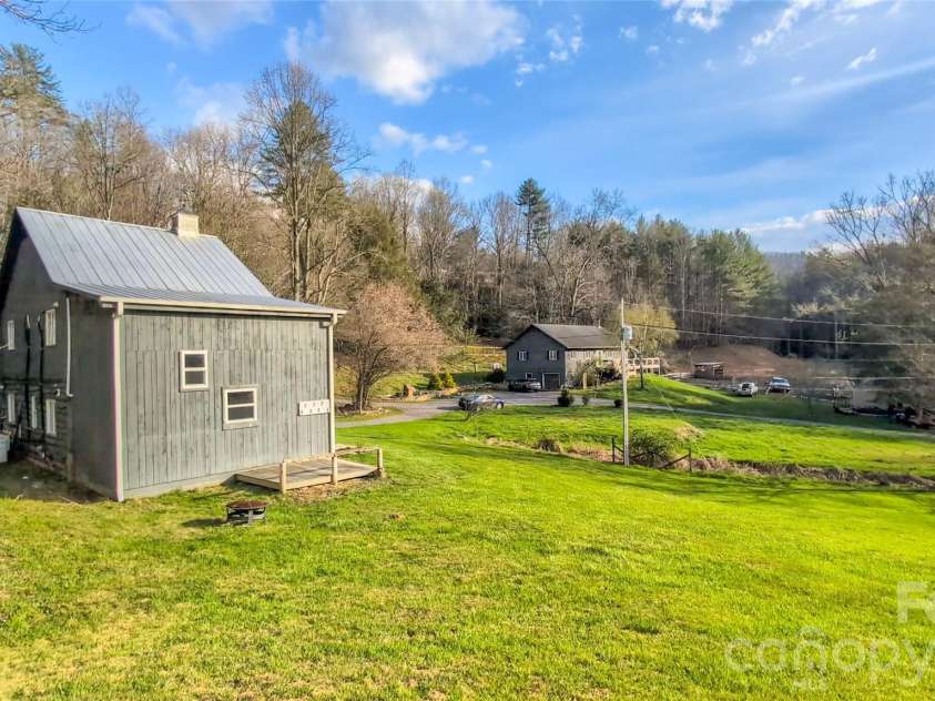 65 Happy Hollow Road, Green Mountain, NC 28740.  MLS# CAR4363965, YatesRealty ID 14402. View from backside of property