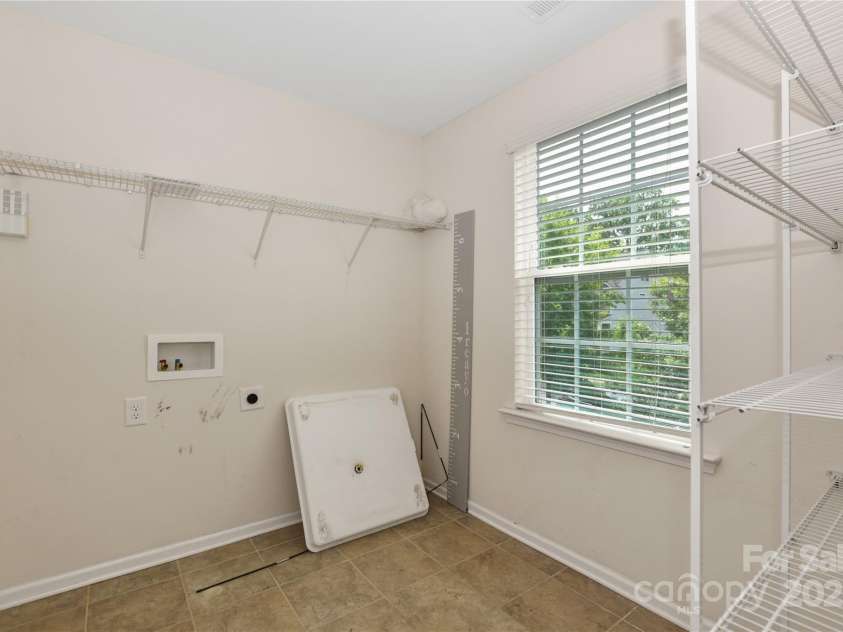 10417 Ebbets Road, Charlotte, NC 28273.  MLS# CAR4250742, YatesRealty ID 14407. Laundry Room