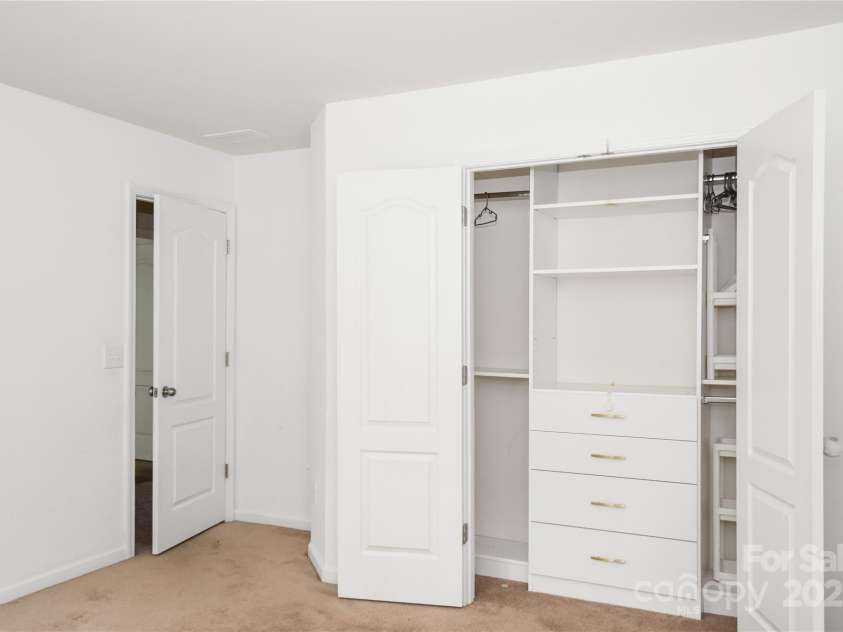 10417 Ebbets Road, Charlotte, NC 28273.  MLS# CAR4250742, YatesRealty ID 14407. Secondary Bedroom closet 1