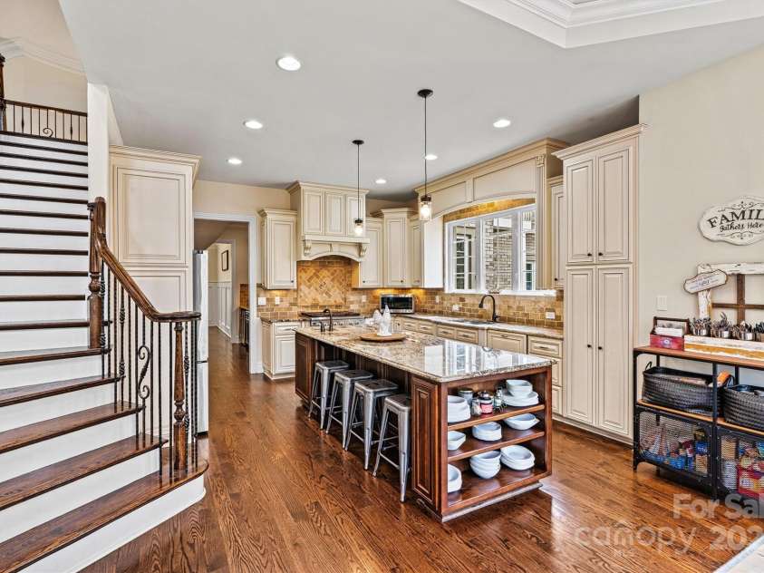 7509 Webbs Chapel Cove Court, Denver, NC 28037.  MLS# CAR4234853, YatesRealty ID 14408. Kitchen and back stairway