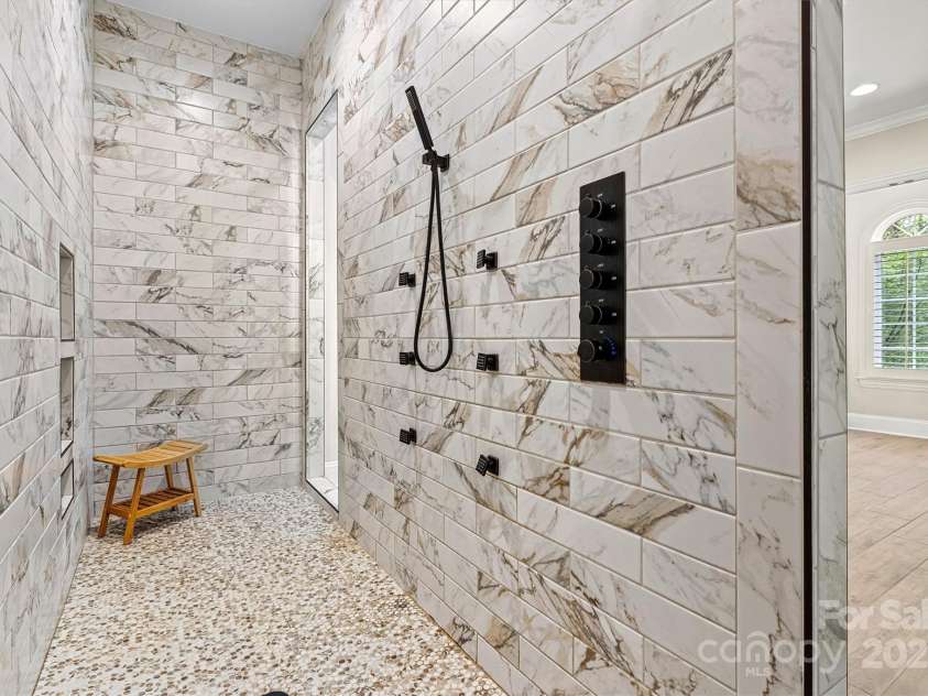 7509 Webbs Chapel Cove Court, Denver, NC 28037.  MLS# CAR4234853, YatesRealty ID 14408. Primary oversize shower with waterfall showerhead