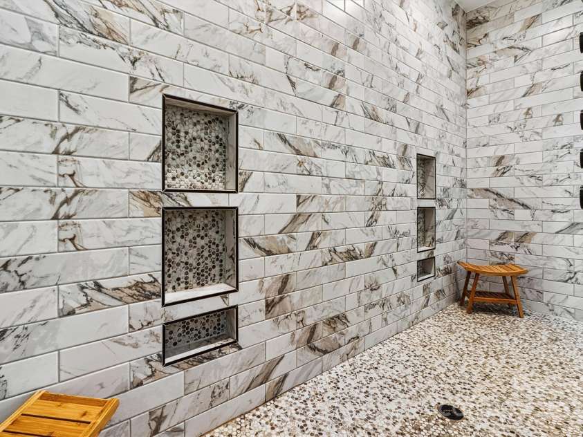 7509 Webbs Chapel Cove Court, Denver, NC 28037.  MLS# CAR4234853, YatesRealty ID 14408. Primary shower built in shelving