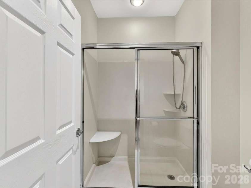 8568 Windsor Ridge Drive, Charlotte, NC 28277.  MLS# CAR4350318, YatesRealty ID 14412. Full size shower in primary bath