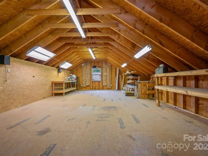 2 Candlestick Drive, Zirconia, NC 28790.  MLS# CAR4260834, YatesRealty ID 14413. Large work/storage above garage