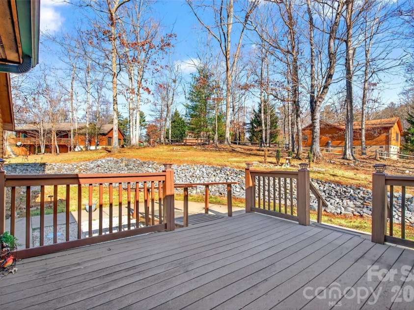 28 Outback Trail, Nebo, NC 28761.  MLS# CAR4349163, YatesRealty ID 14413. Back/side Deck