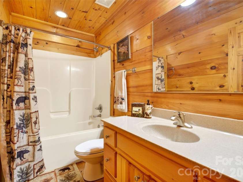 28 Outback Trail, Nebo, NC 28761.  MLS# CAR4349163, YatesRealty ID 14413. Main Level En Suite Bath