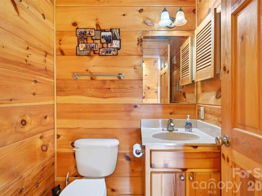 28 Outback Trail, Nebo, NC 28761.  MLS# CAR4349163, YatesRealty ID 14413. Main Level Half Bath