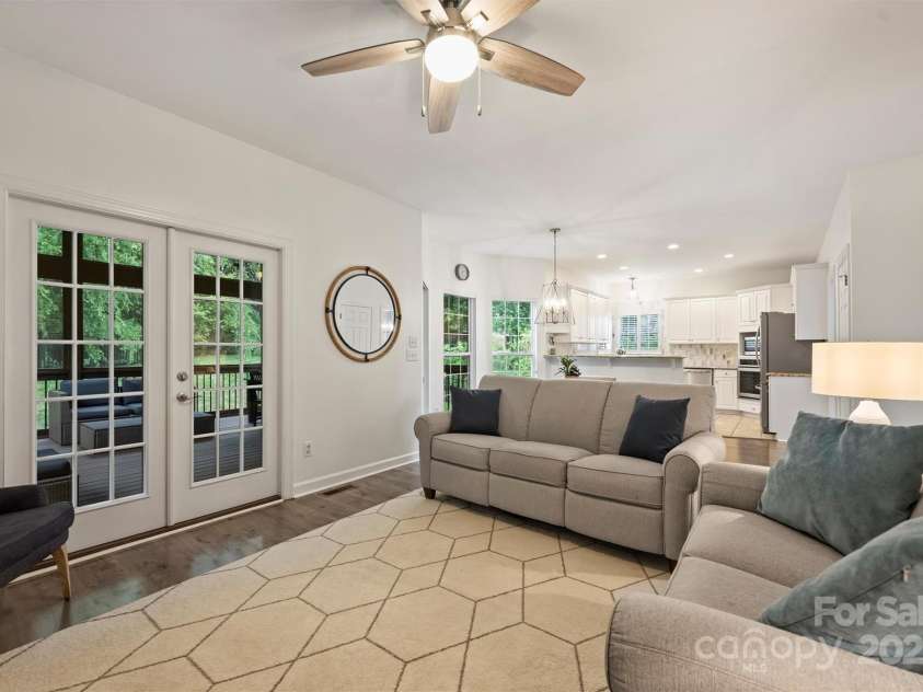 6723 Joliette Lane, Charlotte, NC 28277.  MLS# CAR4251689, YatesRealty ID 14414. Family Room opens out to Screened Porch