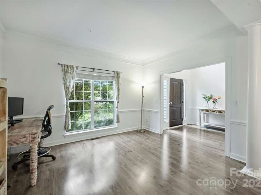 6723 Joliette Lane, Charlotte, NC 28277.  MLS# CAR4251689, YatesRealty ID 14414. Living Room/Office