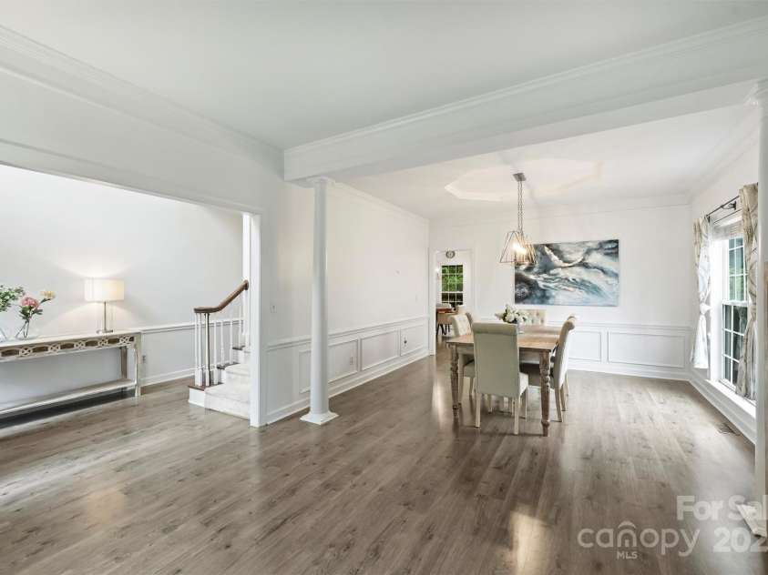 6723 Joliette Lane, Charlotte, NC 28277.  MLS# CAR4251689, YatesRealty ID 14414. Living Room/Office & Dining Room