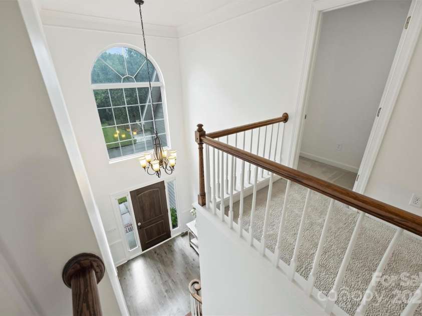 6723 Joliette Lane, Charlotte, NC 28277.  MLS# CAR4251689, YatesRealty ID 14414. Upstairs view of Foyer
