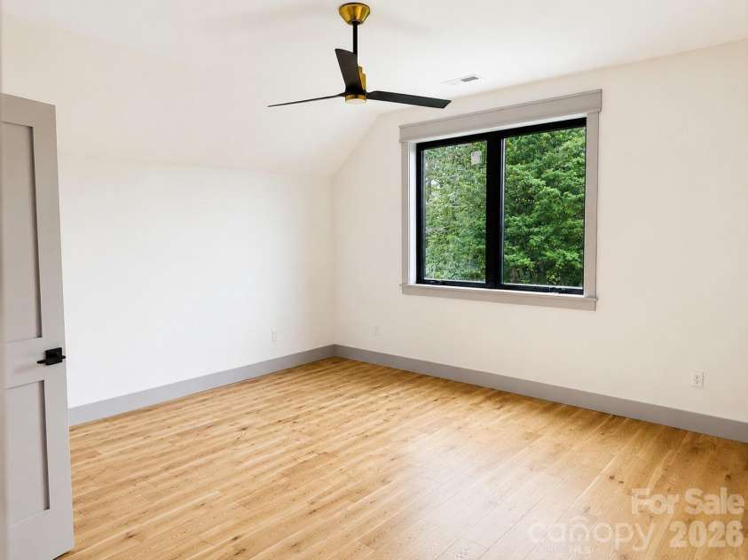 25 Emory Paige Road, Weaverville, NC 28787.  MLS# CAR4332863, YatesRealty ID 14417. Two secondary bedrooms located on the upper level each with its own ensuite bath