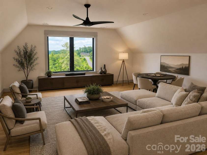 25 Emory Paige Road, Weaverville, NC 28787.  MLS# CAR4332863, YatesRealty ID 14417. Versatile bonus room ideal for media, fitness, hobbies, or guests. Virtually Staged.
