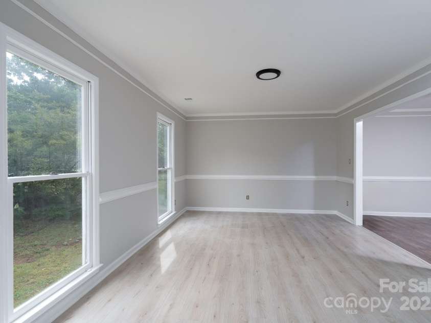 1013 Doby Springs Drive, Charlotte, NC 28262.  MLS# CAR4259903, YatesRealty ID 14420. Livingroom Without Staging