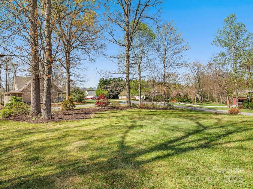 303 Forest Place, Candler, NC 28715.  MLS# CAR4245999, YatesRealty ID 14422. 