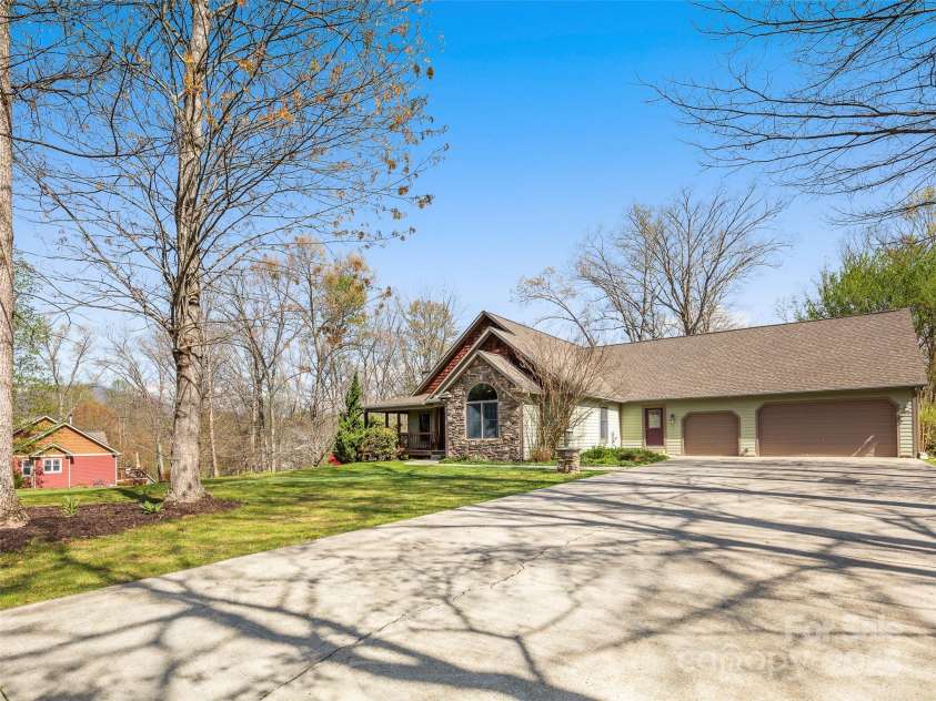 303 Forest Place, Candler, NC 28715.  MLS# CAR4245999, YatesRealty ID 14422. 