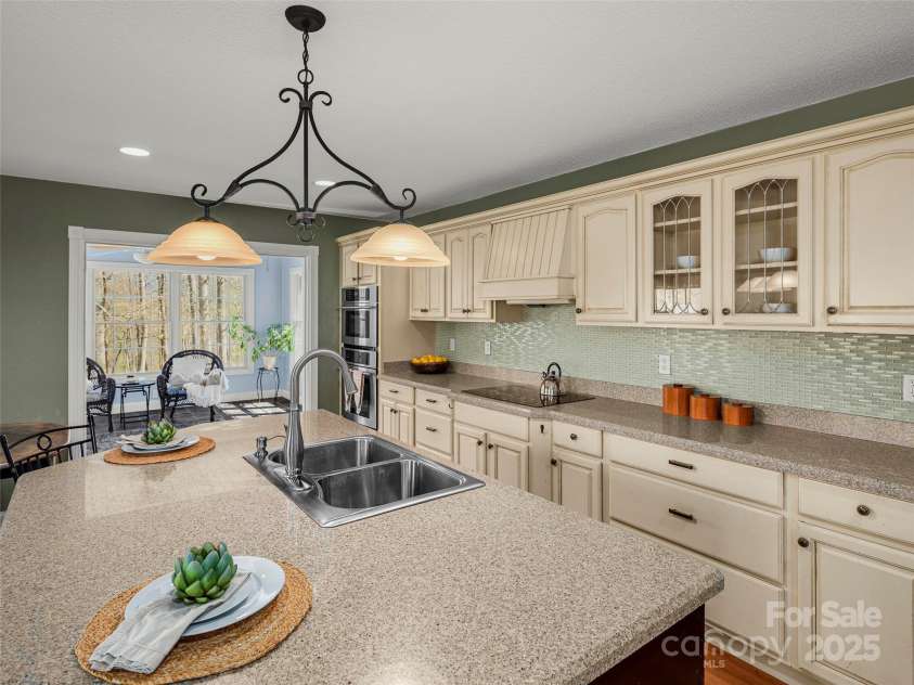 303 Forest Place, Candler, NC 28715.  MLS# CAR4245999, YatesRealty ID 14422. 