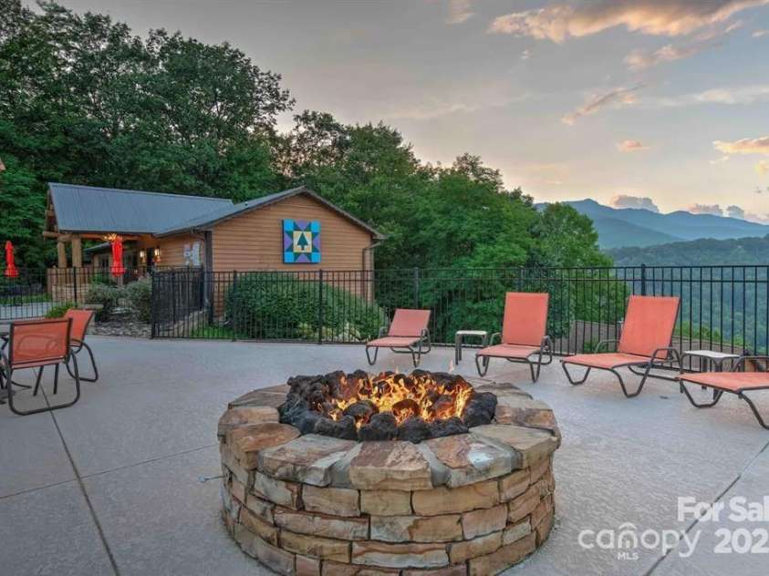 376 Overlook Drive, Burnsville, NC 28714.  MLS# CAR4247465, YatesRealty ID 14424. Firepit