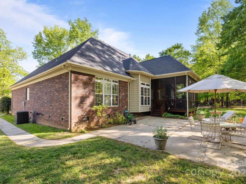7815 Scottsburg Court, Mint Hill, NC 28227.  MLS# CAR4247667, YatesRealty ID 14426. Need extra patio space? This property has 600+ sq feet of it!   Plus a huge backyard for playing, planting, and pondering.
