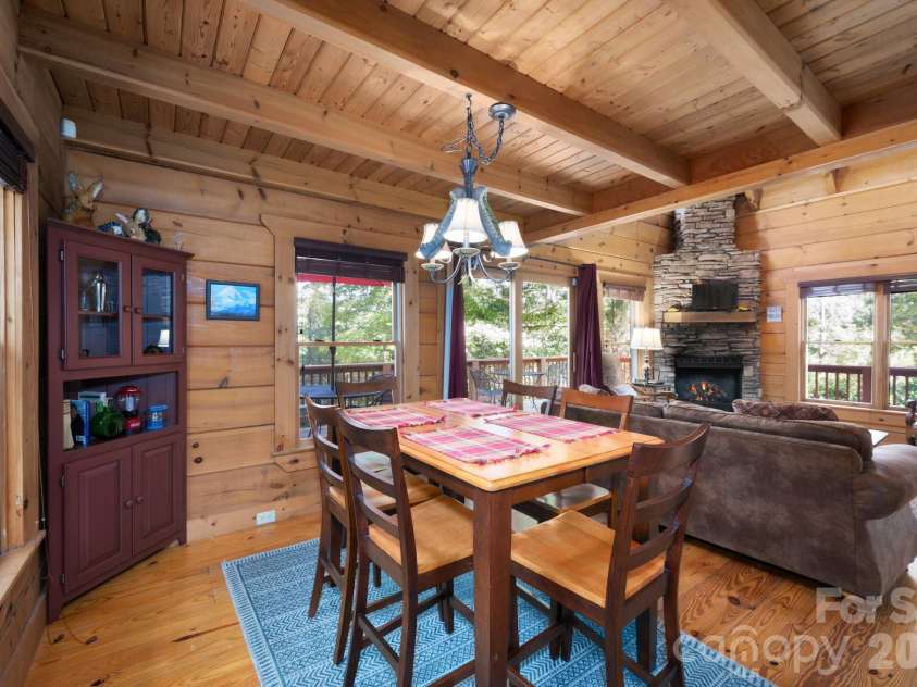 117 Laurel Lakes Parkway, Lake Lure, NC 28746.  MLS# CAR4182403, YatesRealty ID 14428. Dining area open to LR