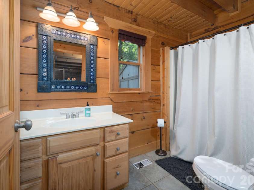 117 Laurel Lakes Parkway, Lake Lure, NC 28746.  MLS# CAR4182403, YatesRealty ID 14428. Main floor full bath