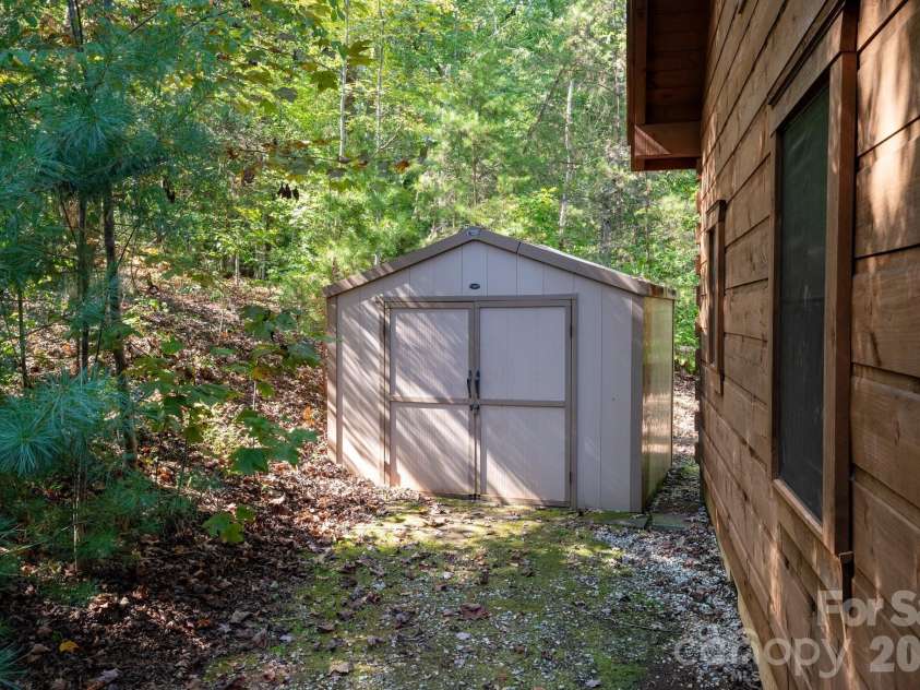 117 Laurel Lakes Parkway, Lake Lure, NC 28746.  MLS# CAR4182403, YatesRealty ID 14428. Shed