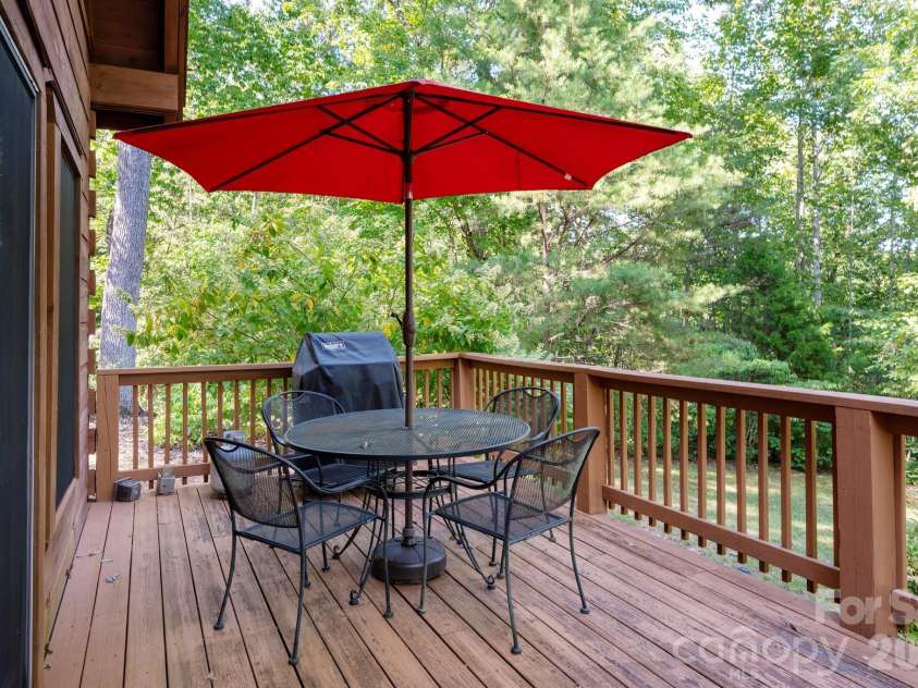 117 Laurel Lakes Parkway, Lake Lure, NC 28746.  MLS# CAR4182403, YatesRealty ID 14428. Side deck