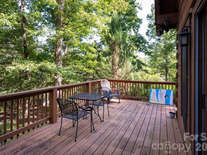 117 Laurel Lakes Parkway, Lake Lure, NC 28746.  MLS# CAR4182403, YatesRealty ID 14428. Side deck