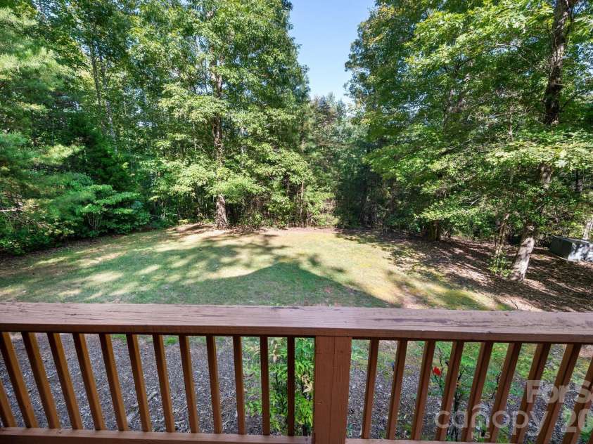 117 Laurel Lakes Parkway, Lake Lure, NC 28746.  MLS# CAR4182403, YatesRealty ID 14428. Side yard