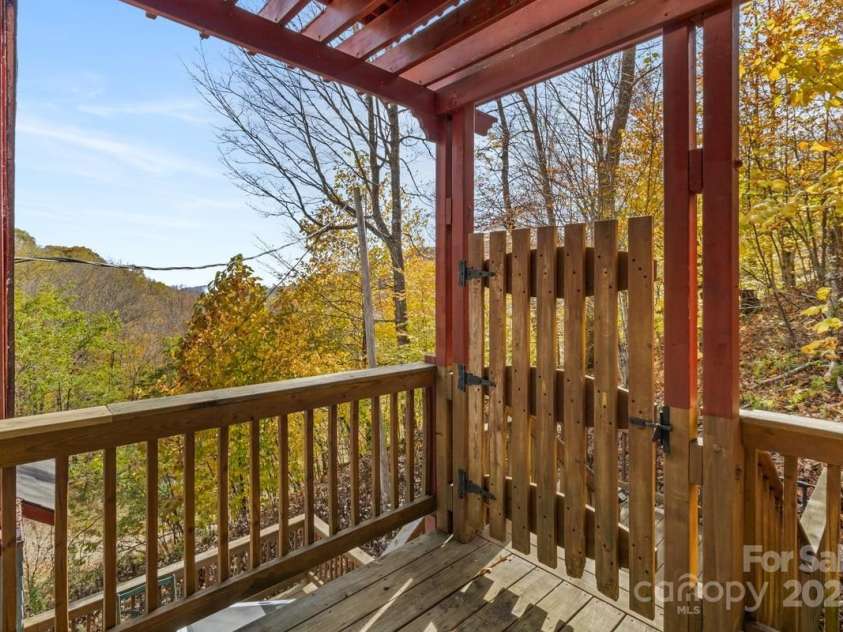 563 Bee Tree Lane, Mars Hill, NC 28754.  MLS# CAR4317356, YatesRealty ID 1443. Private balcony off Primary Suite