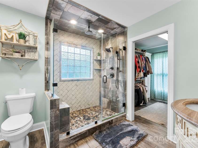 148 Fairway Drive, Forest City, NC 28043.  MLS# CAR4257747, YatesRealty ID 14433. Primary bath