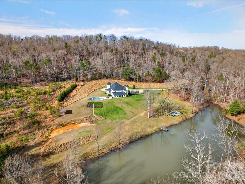 300 Springhill Drive, Rutherfordton, NC 28139.  MLS# CAR4360102, YatesRealty ID 14438. Pond with campfire anyone?