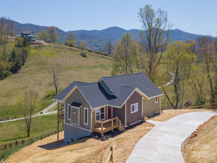 191 Aster Ridge Drive, Waynesville, NC 28786.  MLS# CAR4248737, YatesRealty ID 14439. Serene setting, with both meadows and mountains