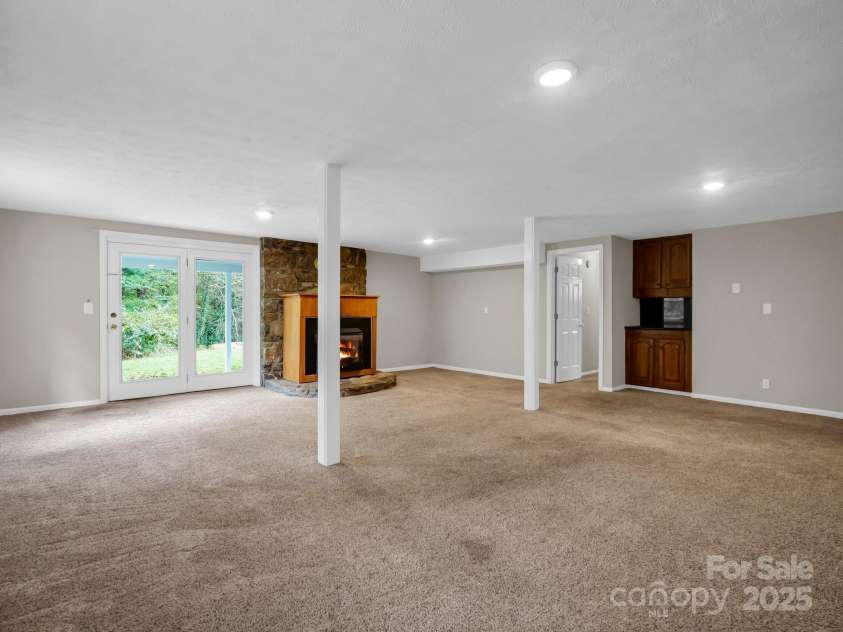 200 Frost Road, Saluda, NC 28773.  MLS# CAR4186727, YatesRealty ID 14440. Basement family room