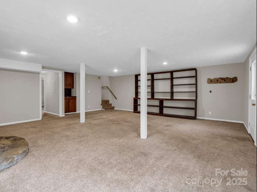 200 Frost Road, Saluda, NC 28773.  MLS# CAR4186727, YatesRealty ID 14440. Basement family room