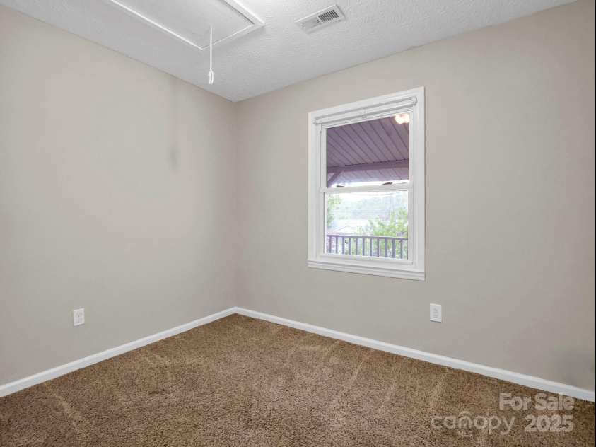 200 Frost Road, Saluda, NC 28773.  MLS# CAR4186727, YatesRealty ID 14440. Guest bedroom 2