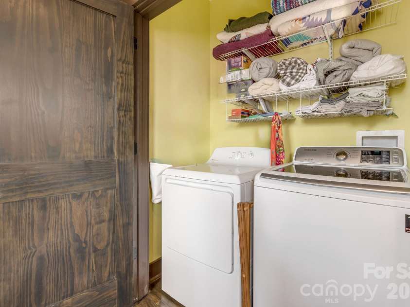 226 Flint Street, Asheville, NC 28801.  MLS# CAR4301613, YatesRealty ID 14445. Laundry area on upper floor