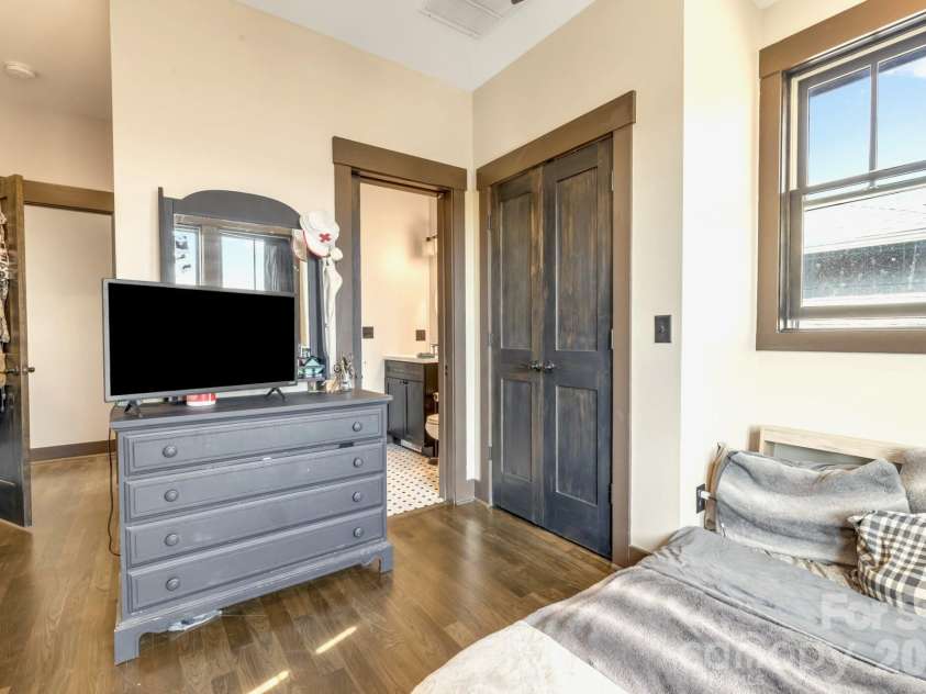 226 Flint Street, Asheville, NC 28801.  MLS# CAR4301613, YatesRealty ID 14445. Third bedroom on upper floor
