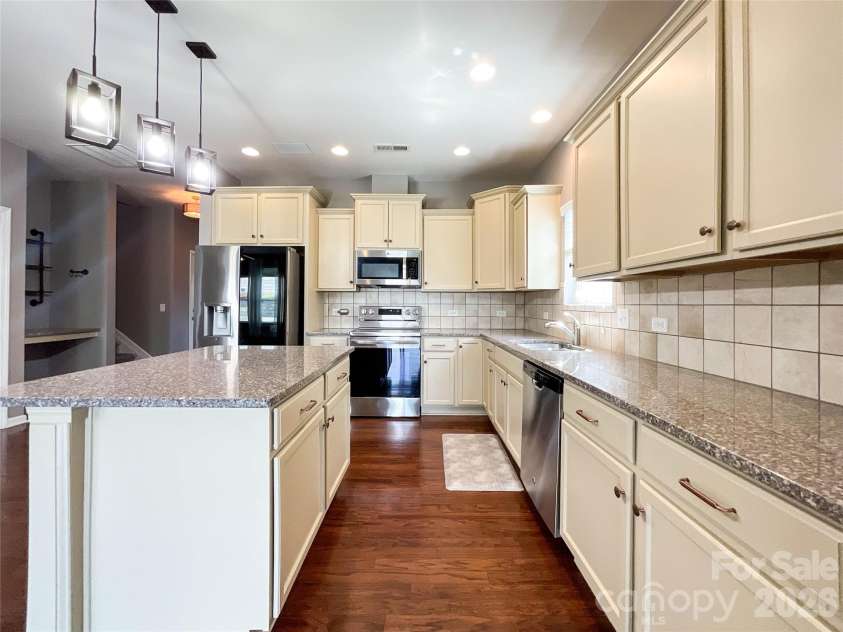 1300 Afternoon Sun Road, Matthews, NC 28104.  MLS# CAR4351669, YatesRealty ID 14448. 