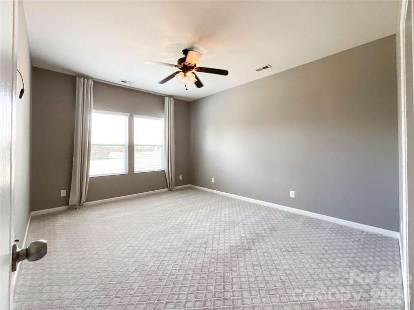 1300 Afternoon Sun Road, Matthews, NC 28104.  MLS# CAR4351669, YatesRealty ID 14448. Primary bedroom