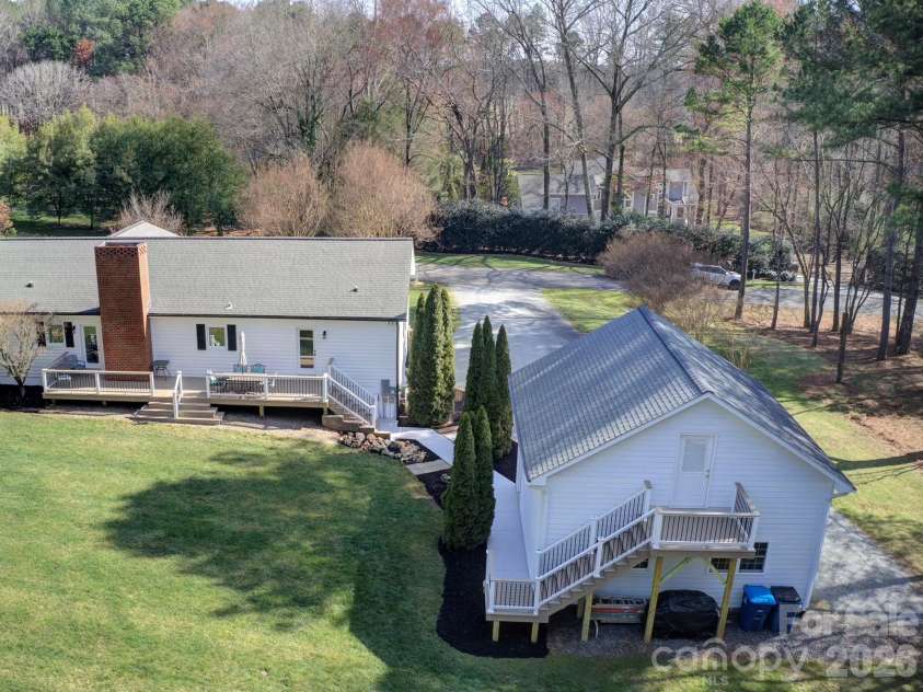 2429 Cassidy Drive, Davidson, NC 28036.  MLS# CAR4349730, YatesRealty ID 14449. Exterior stairs lead to unfinished 2nd level garage