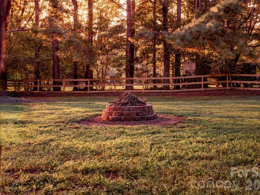 2429 Cassidy Drive, Davidson, NC 28036.  MLS# CAR4420057, YatesRealty ID 14449. Fire Pit