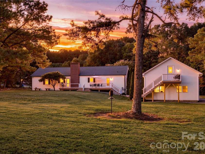 2429 Cassidy Drive, Davidson, NC 28036.  MLS# CAR4420057, YatesRealty ID 14449. Rear of Property, Deck, & Garage